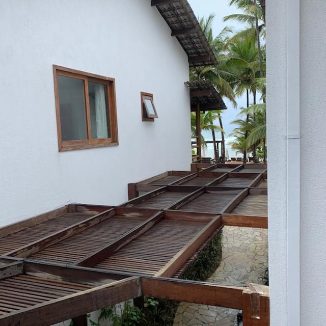 Maraú Beach House Flat 107 pé na areia - Dreamland Apart Taipú de Fora Barra Grande-BA - Housity