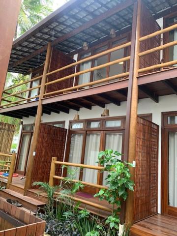 Maraú Beach House Flat 107 pé na areia - Dreamland Apart Taipú de Fora Barra Grande-BA - Housity