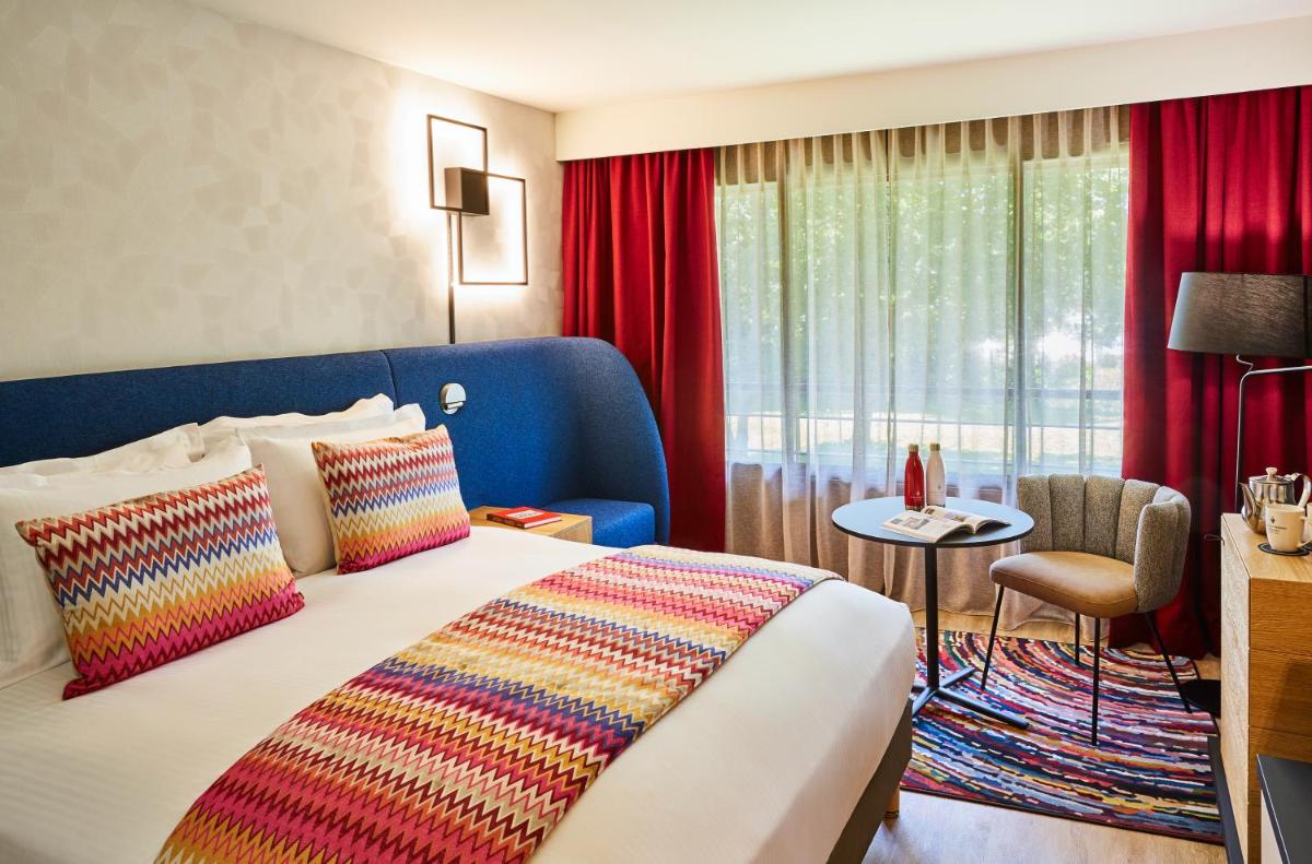 Un ou plusieurs lits dans un hébergement de l'établissement Cabot Hotel Bordeaux - MGallery Collection