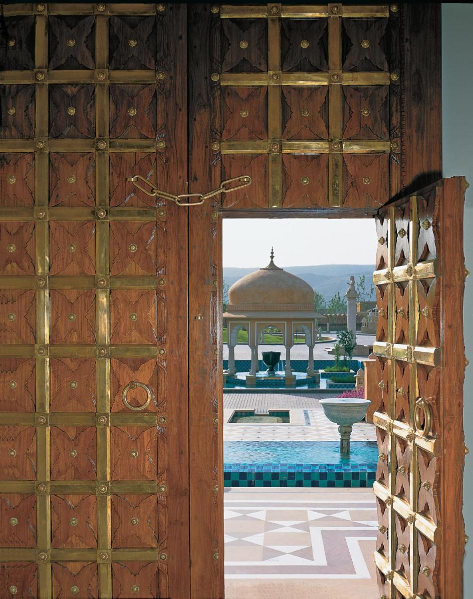 an open door with a building in the background at The Oberoi Rajvilas Jaipur in Jaipur