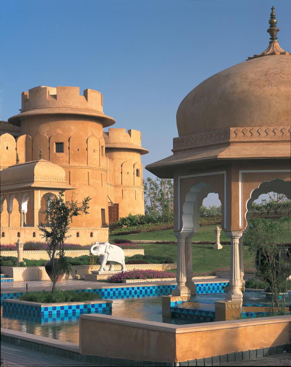 a building with a gazebo in front of it at The Oberoi Rajvilas Jaipur in Jaipur