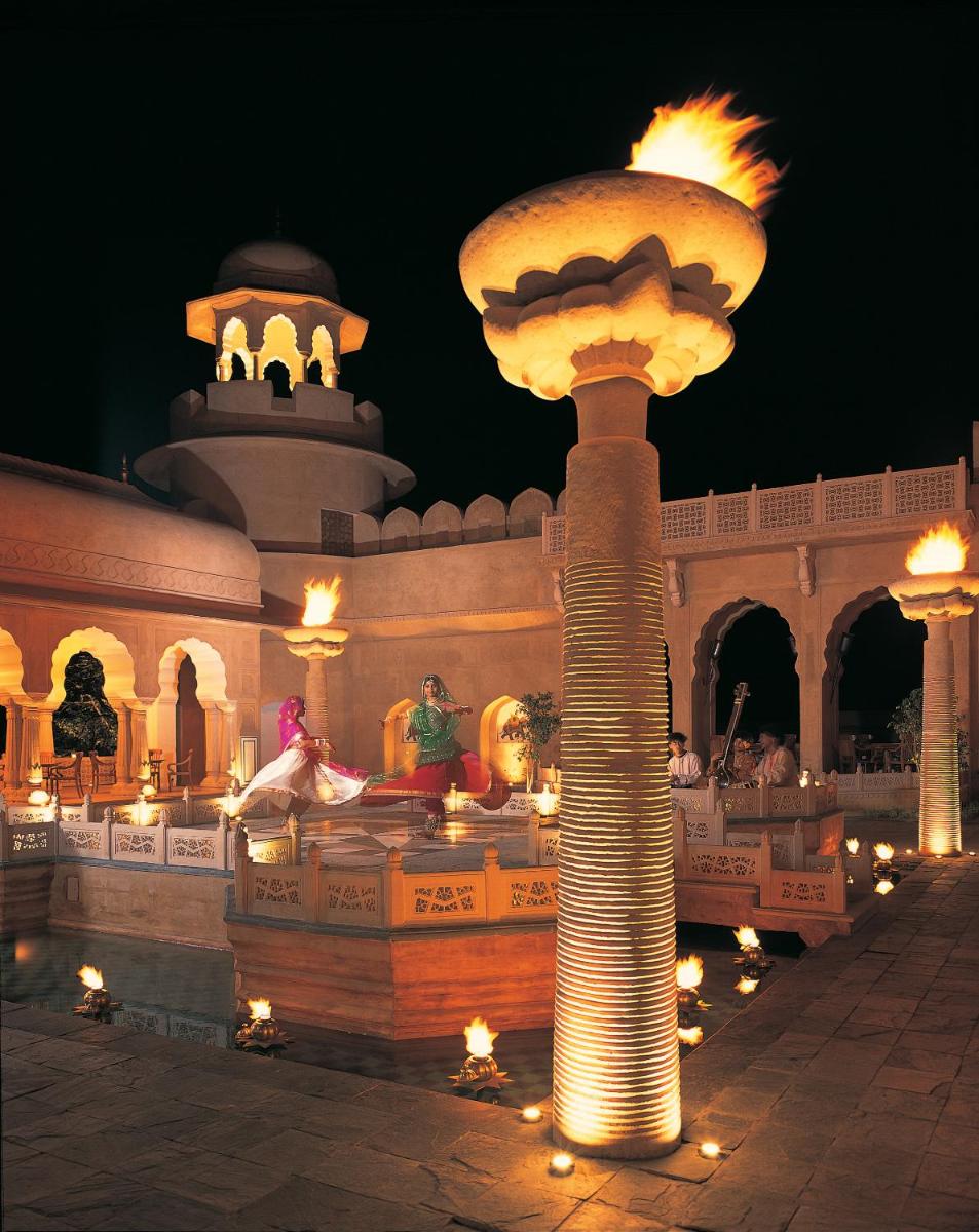 a large building with a large mushroom light in front of it at The Oberoi Rajvilas Jaipur in Jaipur