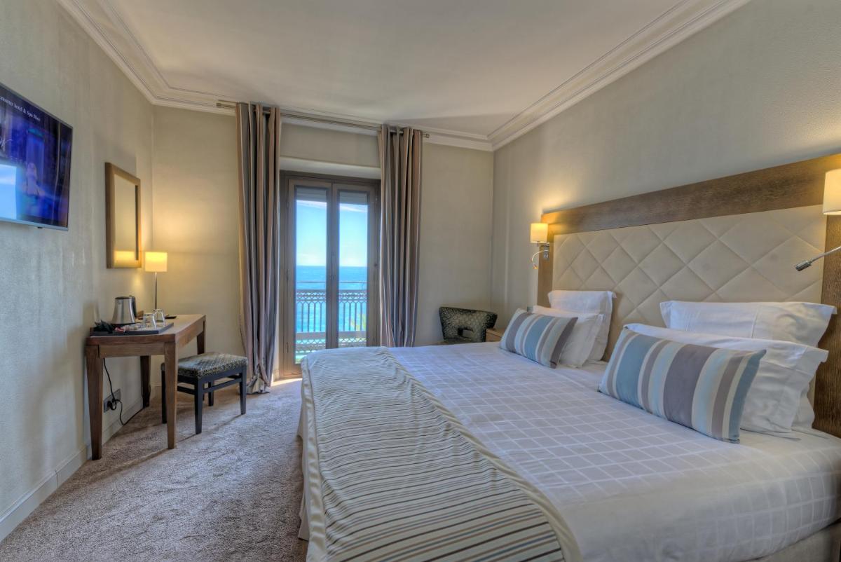 Un ou plusieurs lits dans un hébergement de l'établissement Westminster Hotel & Spa Nice
