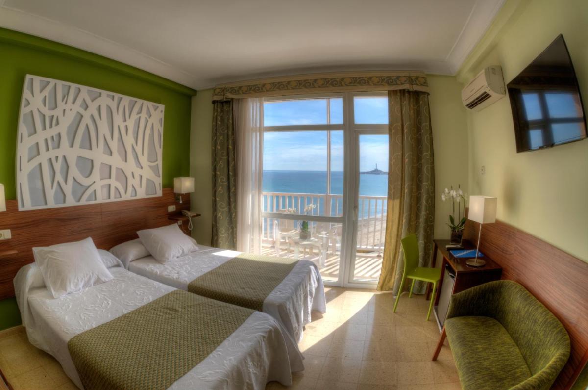 Cama o camas de una habitación en Hotel & Spa Entremares
