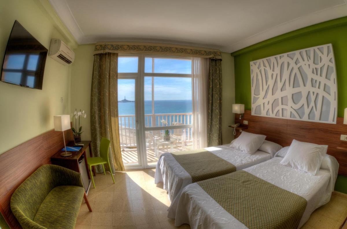 Cama o camas de una habitación en Hotel & Spa Entremares