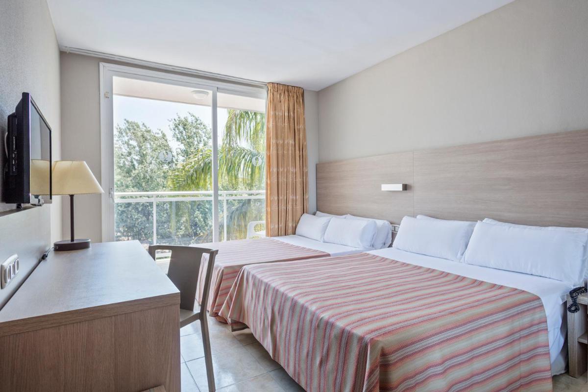 Cama o camas de una habitación en Sol Costa Daurada