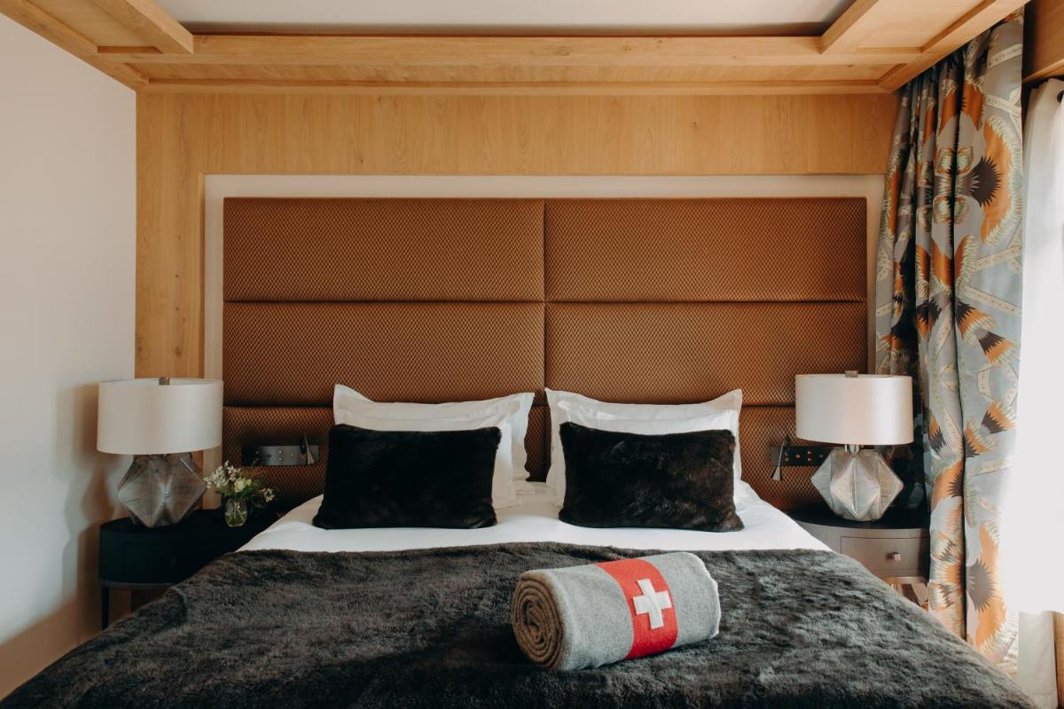 Un ou plusieurs lits dans un hébergement de l'établissement Armancette - The Leading Hotels of the World