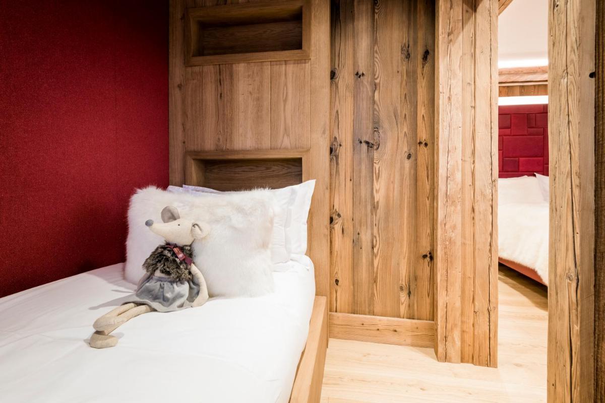 Un ou plusieurs lits dans un hébergement de l'établissement Armancette - The Leading Hotels of the World