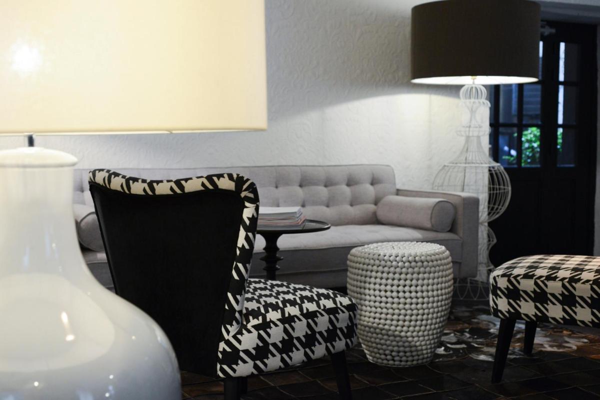 Coin salon dans l'établissement Petit Hôtel Confidentiel