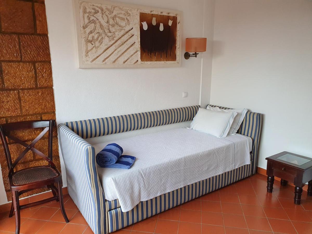 Uma cama ou camas num quarto em Hotel do Cerro