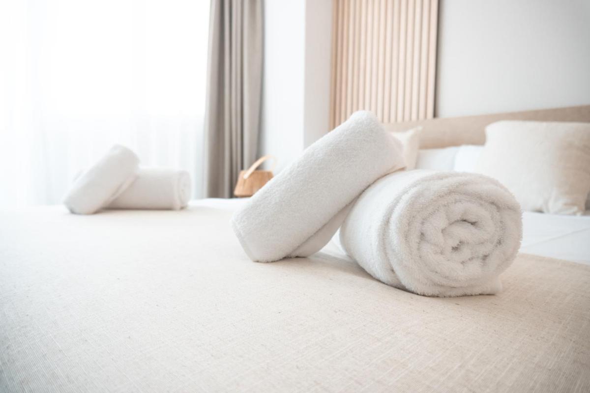 Cama o camas de una habitación en Portomar Apartments - 4-Star Superior Hotel