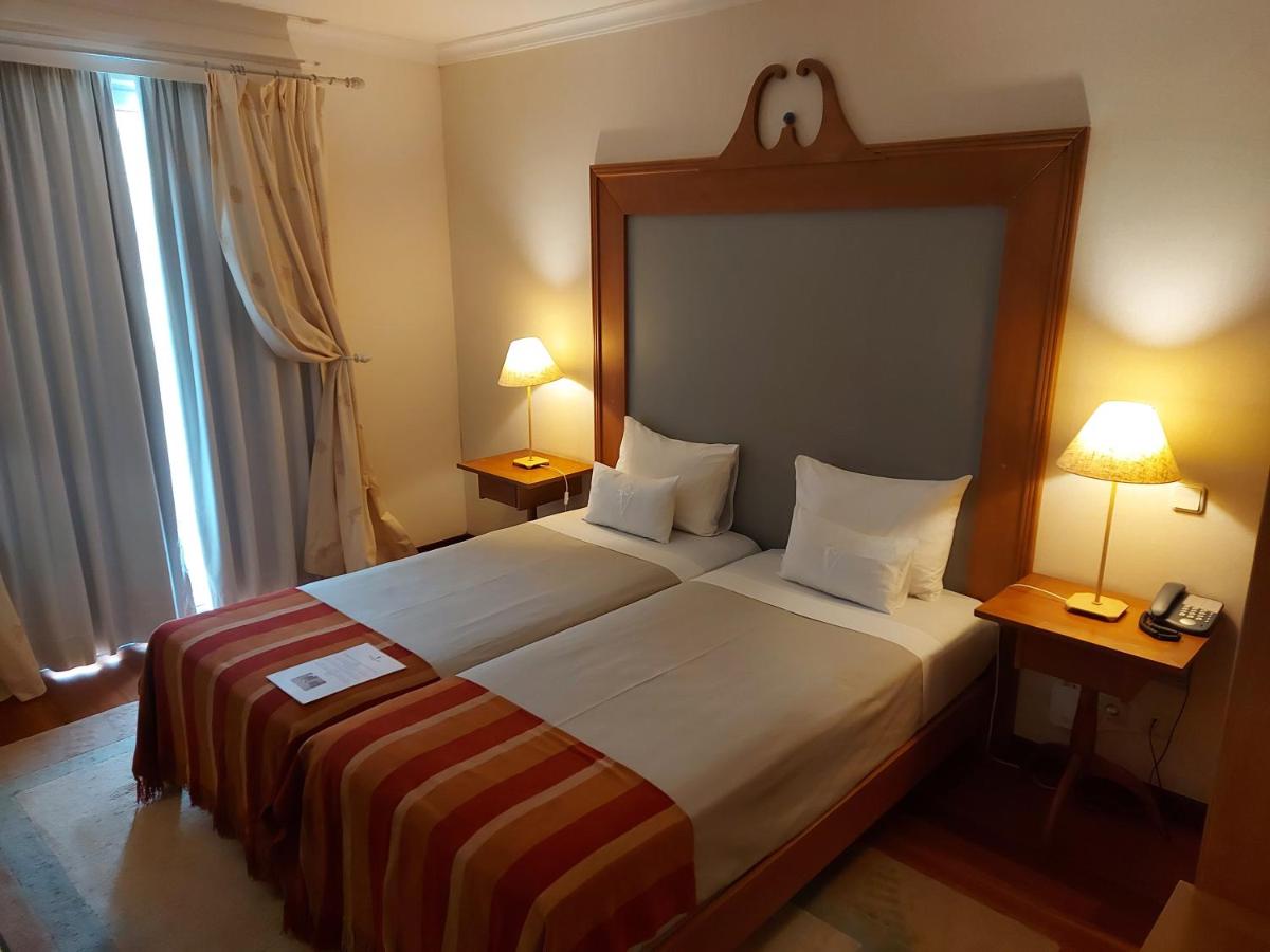 Uma cama ou camas num quarto em Estalagem do Vale