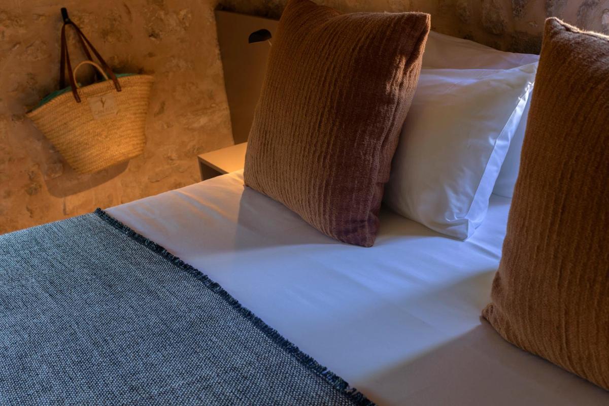 Cama o camas de una habitación en Can Aulí Luxury Retreat - Adults Only
