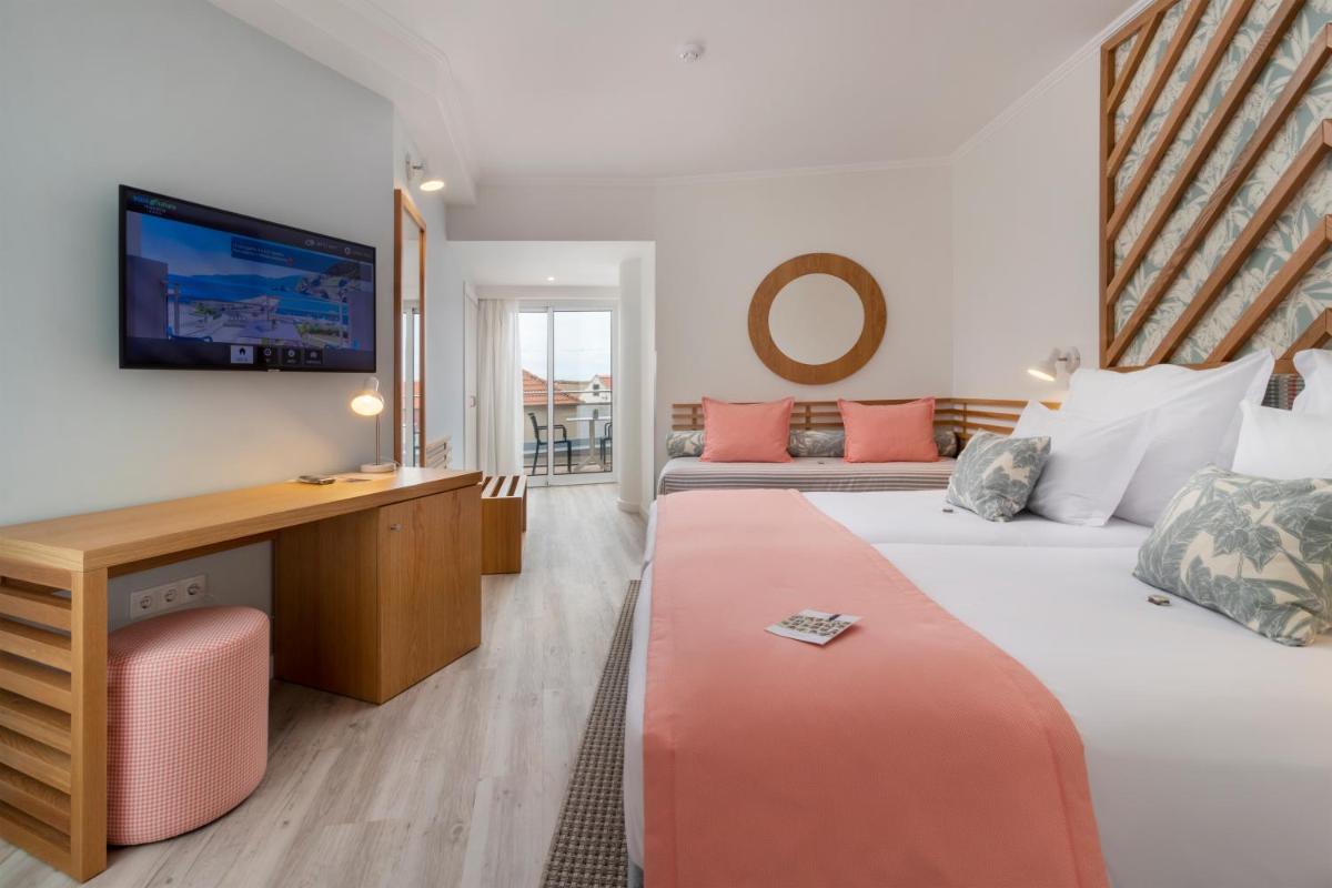 Uma cama ou camas num quarto em Aqua Natura Bay