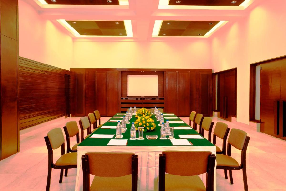 a conference room with a long table and chairs at Trident Agra in Agra