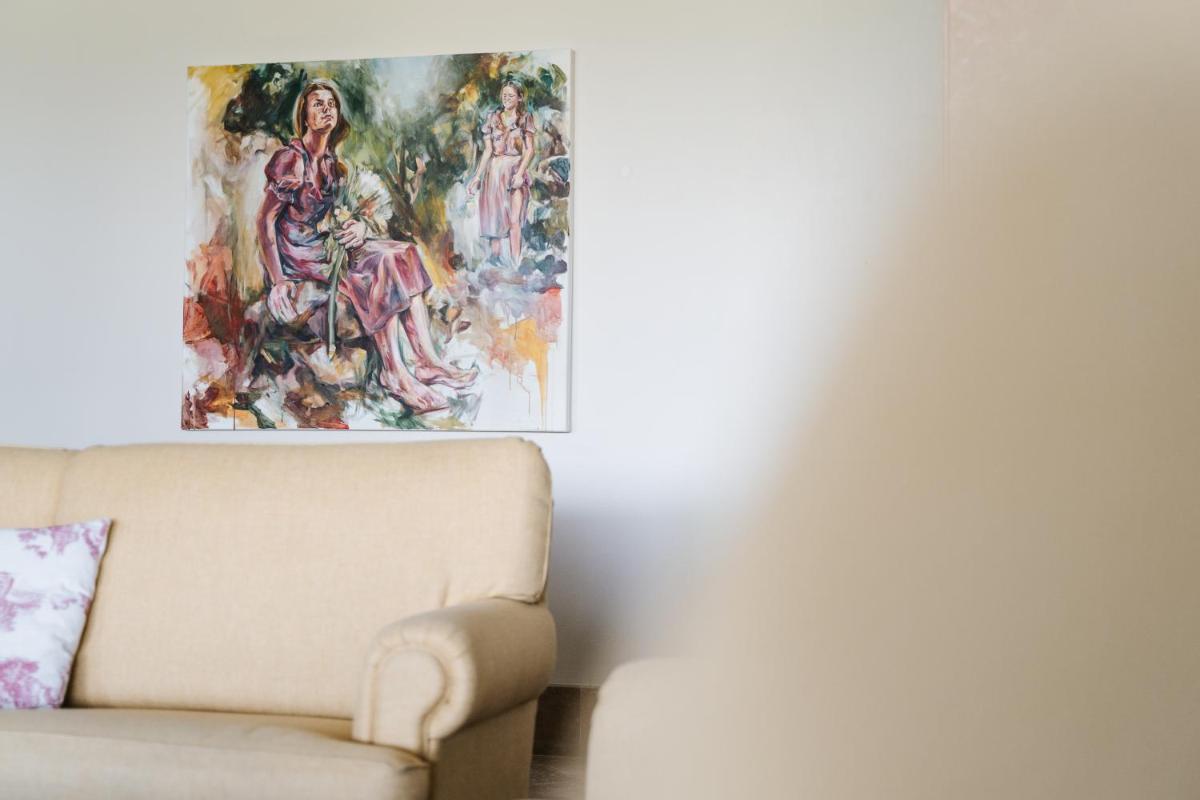Uma área de estar em Conimbriga Hotel do Paço