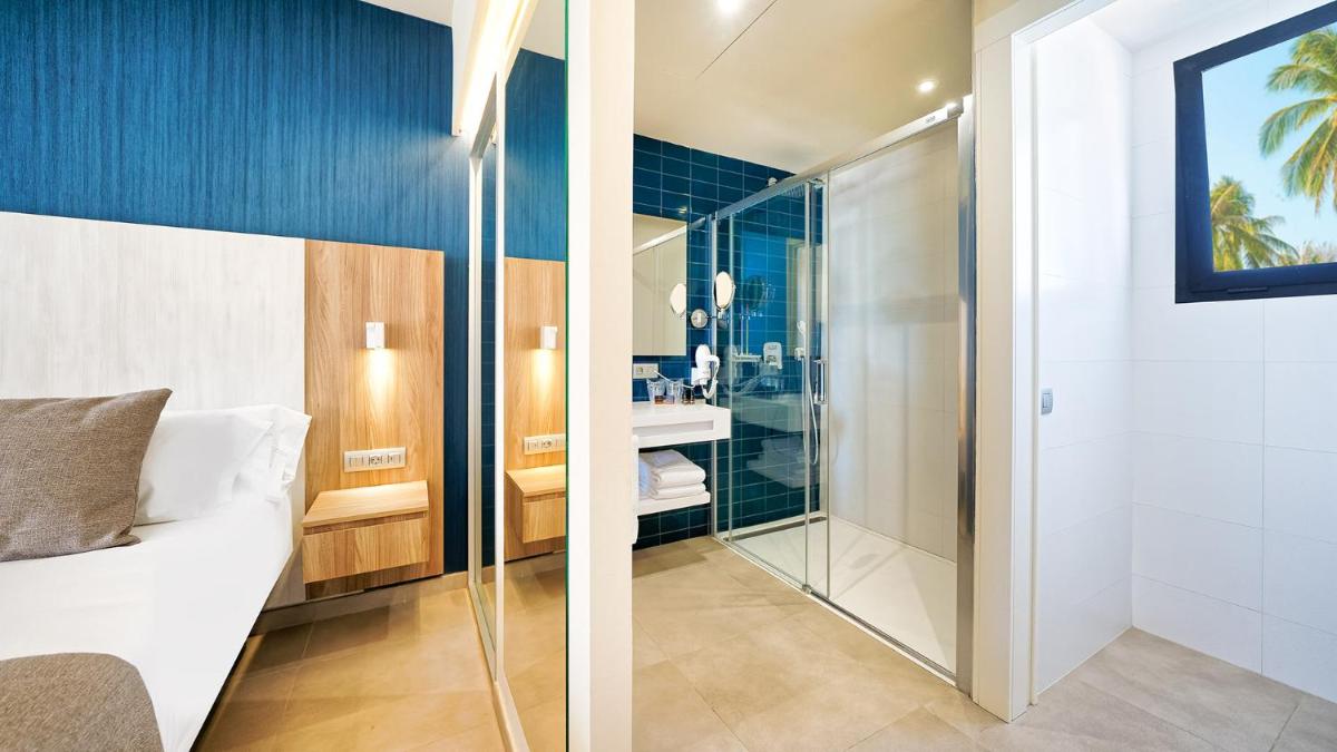 Cama o camas de una habitación en Club Maspalomas Suites & Spa - Adults Only