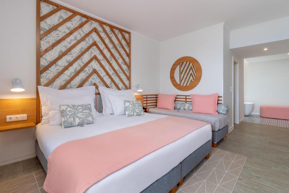 Uma cama ou camas num quarto em Aqua Natura Bay