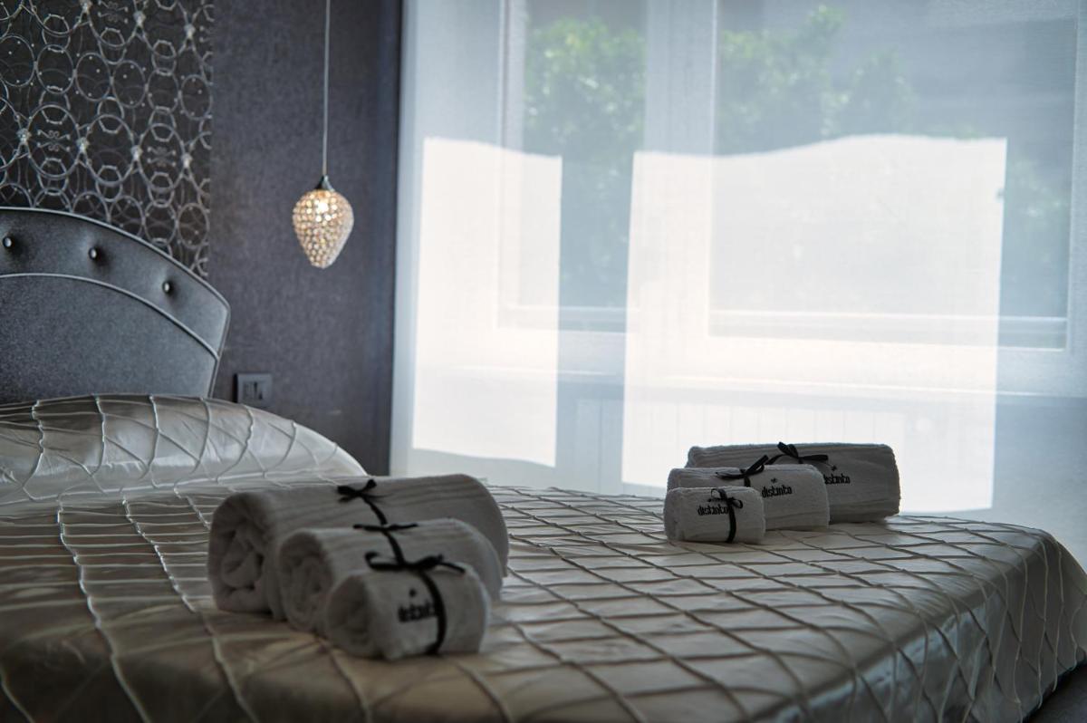 DISTINTO SUITE & ROOMS - Housity