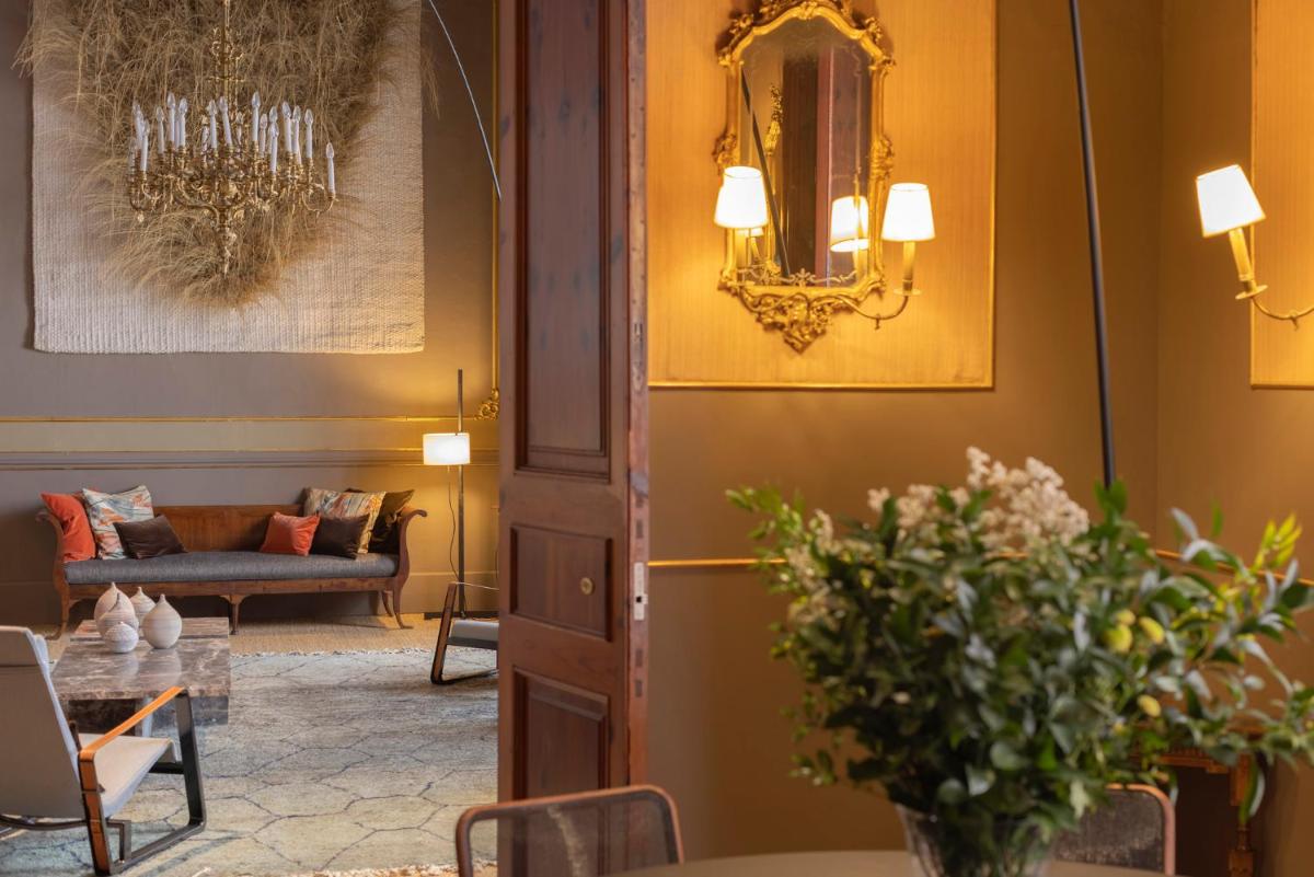 Zona de estar de Hotel Can Cera