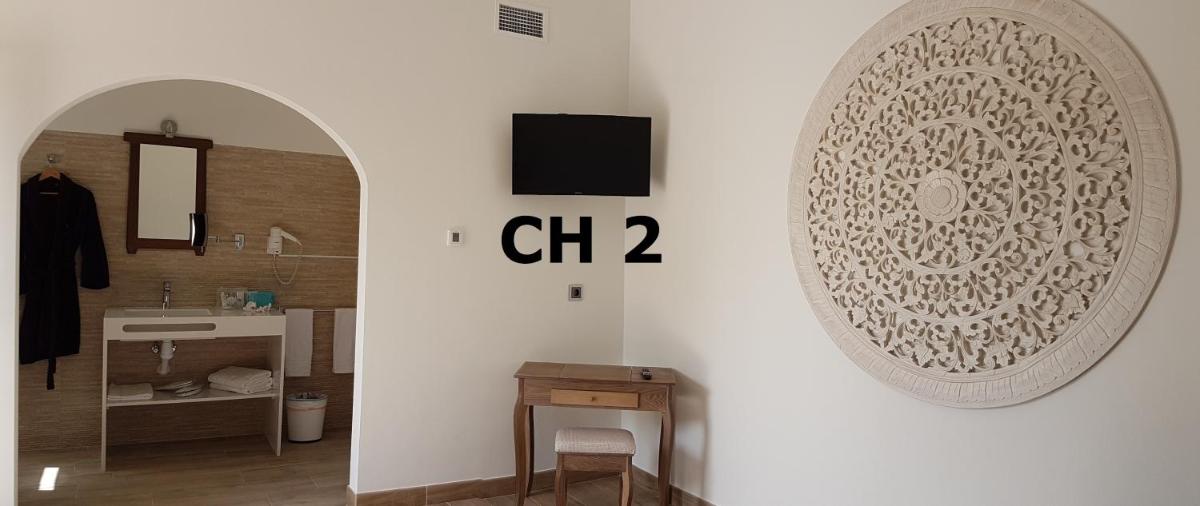 Una televisión o centro de entretenimiento en Artmonia