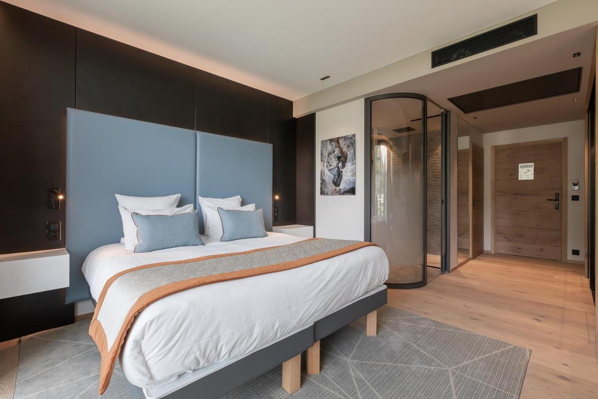 Un ou plusieurs lits dans un hébergement de l'établissement Rivage Hôtel & Spa Annecy