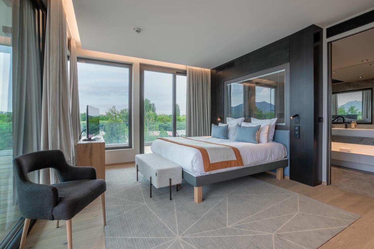Un ou plusieurs lits dans un hébergement de l'établissement Rivage Hôtel & Spa Annecy