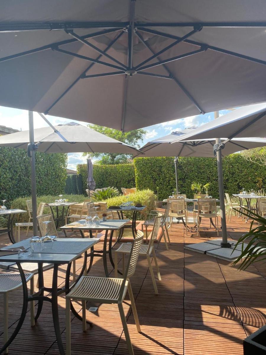 Restaurant ou autre lieu de restauration dans l'établissement Hotel L'Hotan