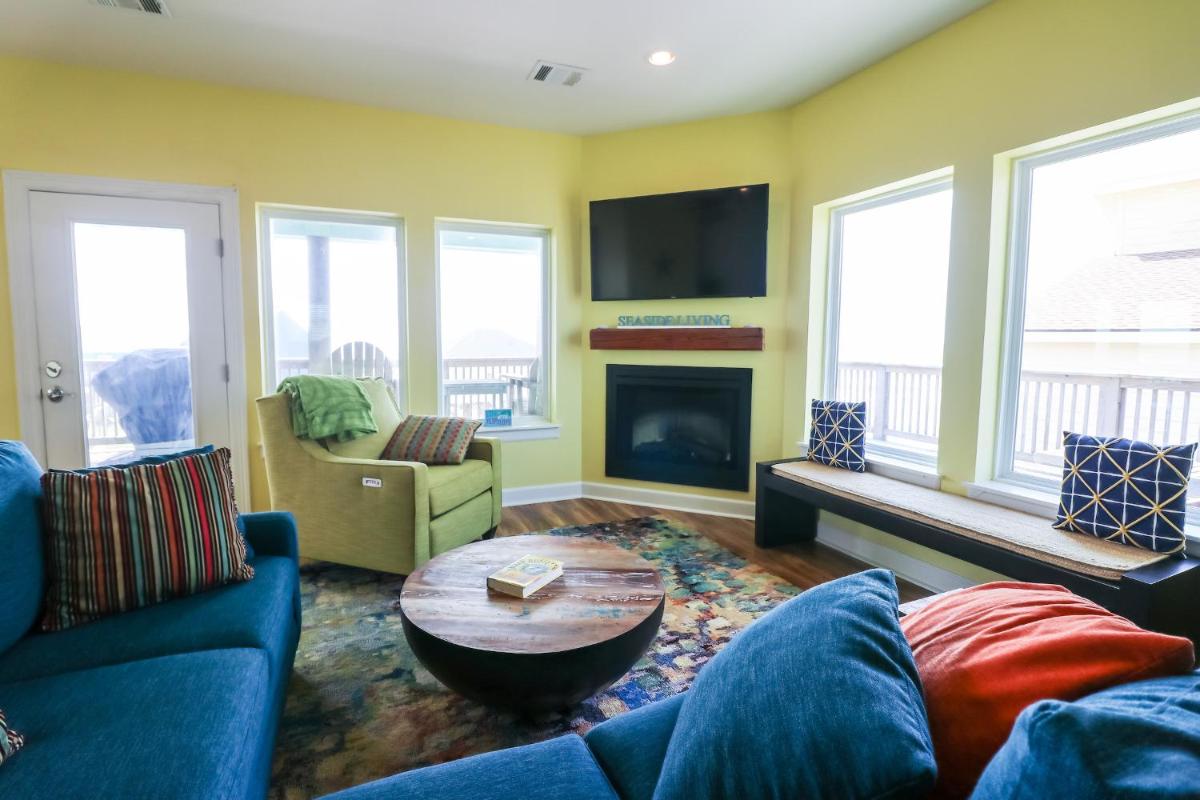 Awave From It All Treasure Island Beach Home with Breathtaking views from two decks - Housity