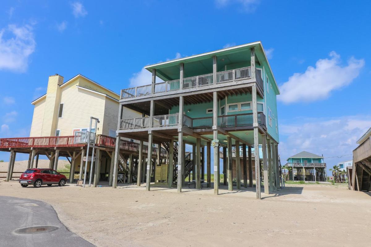 Awave From It All Treasure Island Beach Home with Breathtaking views from two decks - Housity
