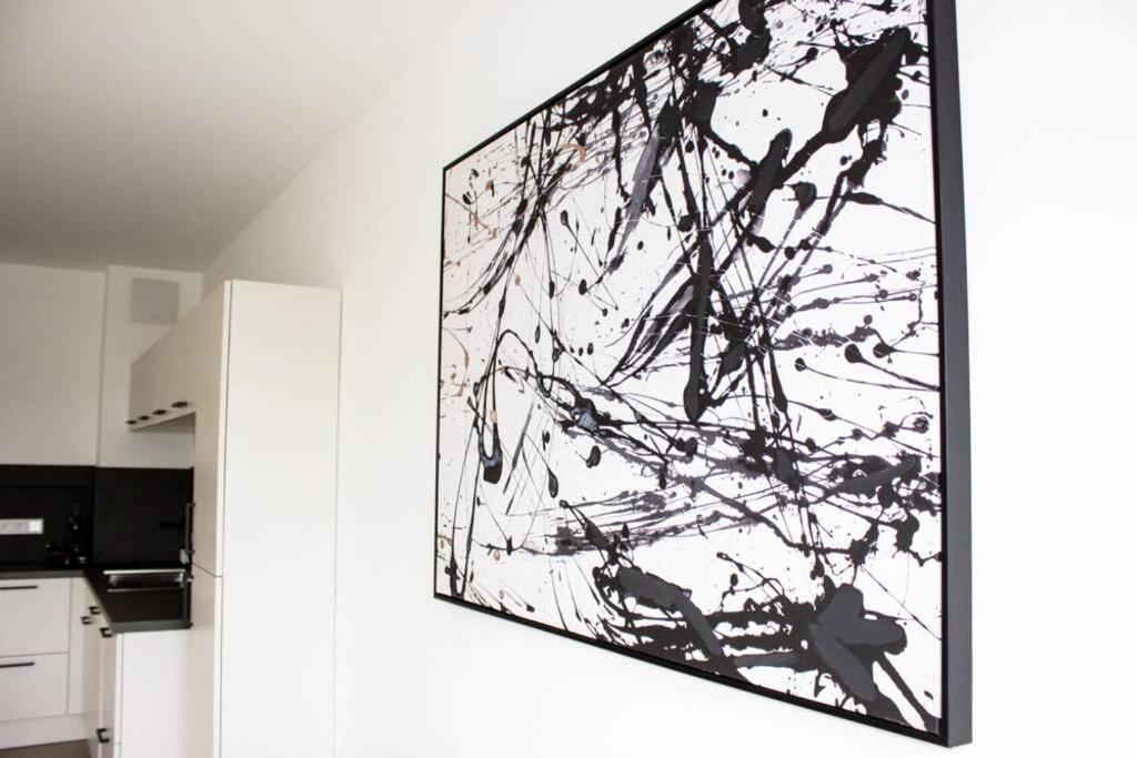 Luxuriöses Neubau-Apartment mit e-Lade Parkplatz - Housity