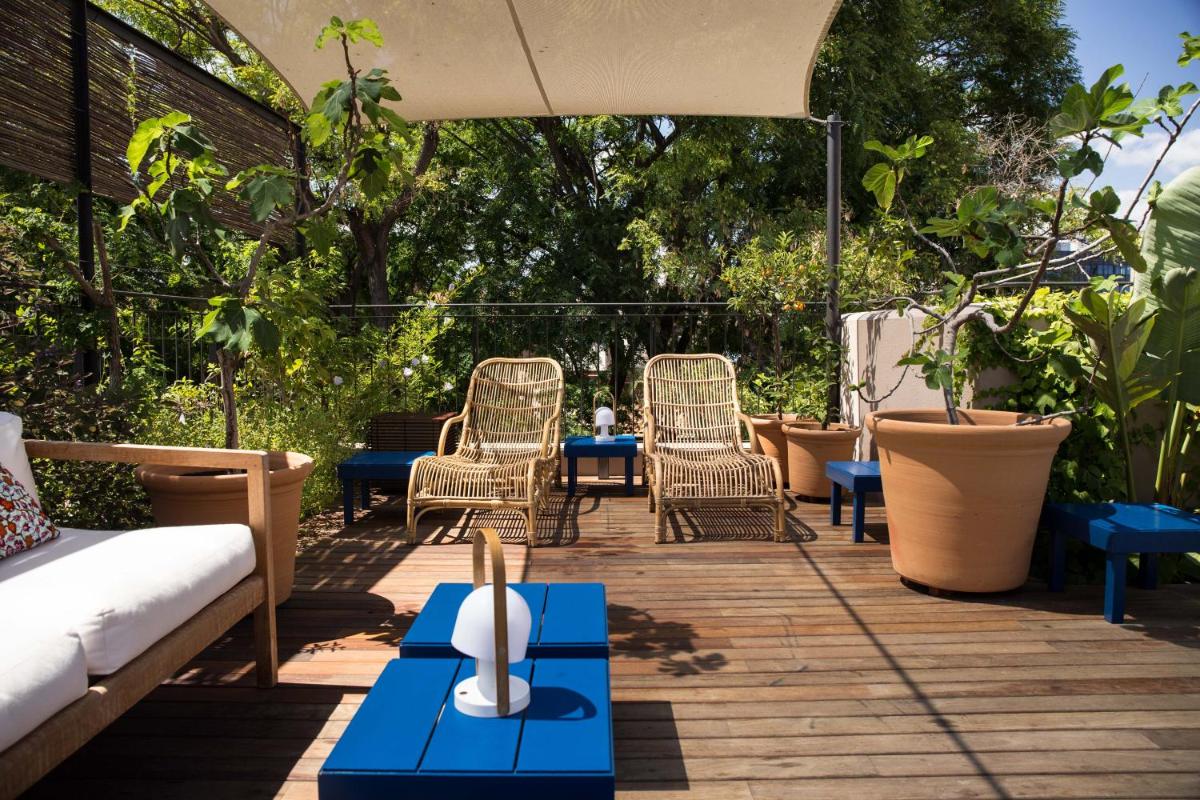 Jardín al aire libre en Hotel Neri – Relais & Chateaux