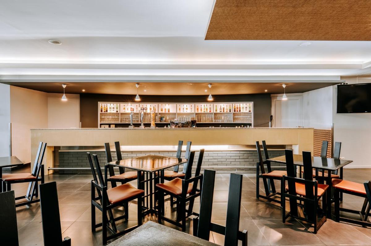 Um restaurante ou outro lugar para comer em Enotel Lido - All Inclusive