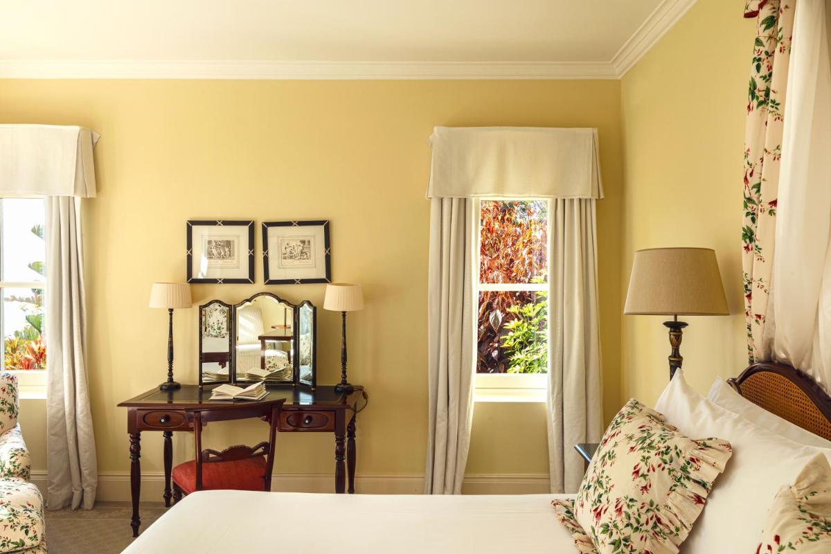 Uma cama ou camas num quarto em Reid's Palace, A Belmond Hotel, Madeira