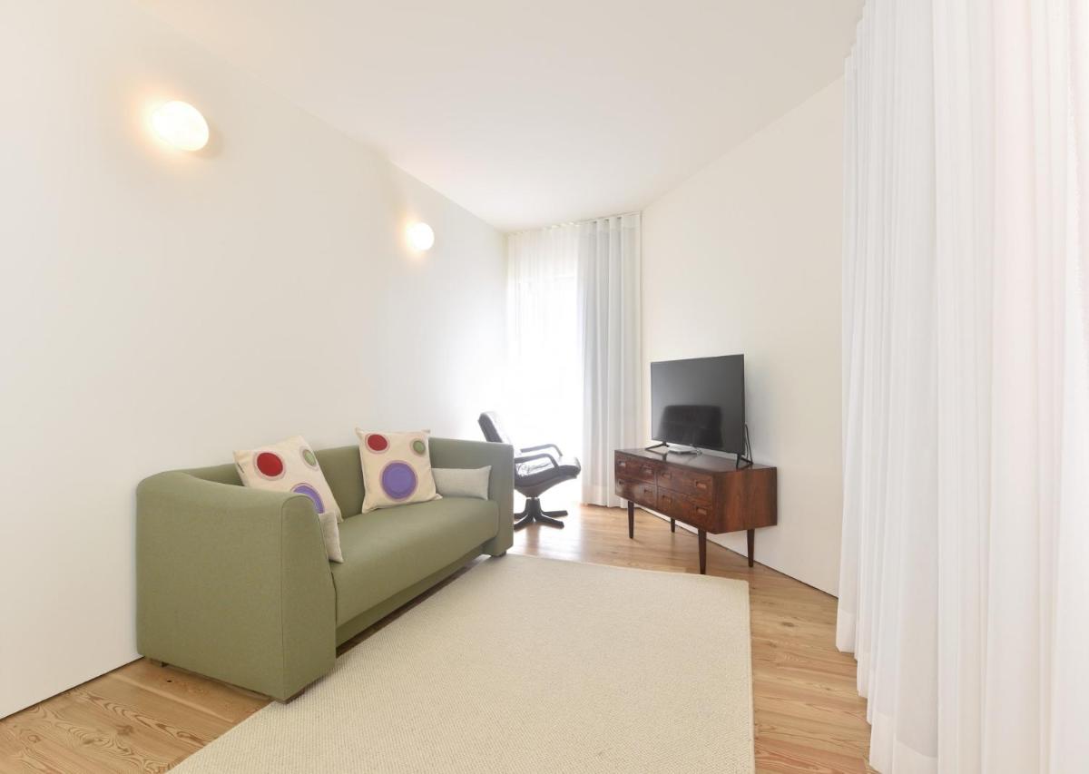 Uma televisão e/ou sistema de entretenimento em Casas Da Lapa, Nature & Spa Hotel