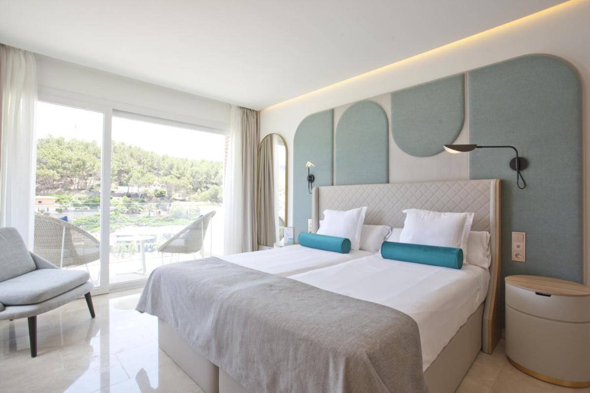 Cama o camas de una habitación en Grupotel Molins