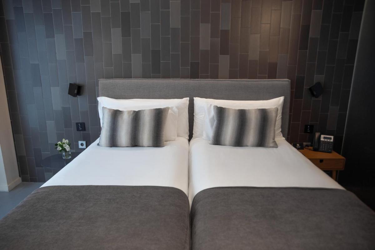 Cama o camas de una habitación en Ohla Eixample