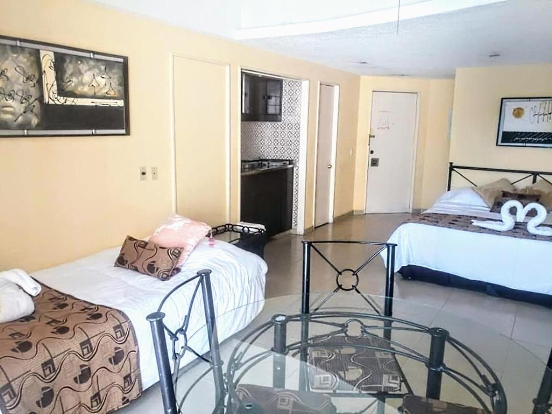Suite en torres gemelas vista al mar - Housity