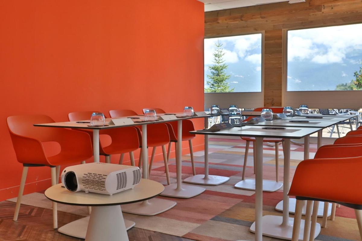 Restaurant ou autre lieu de restauration dans l'établissement SOWELL HOTELS Mont Blanc et SPA