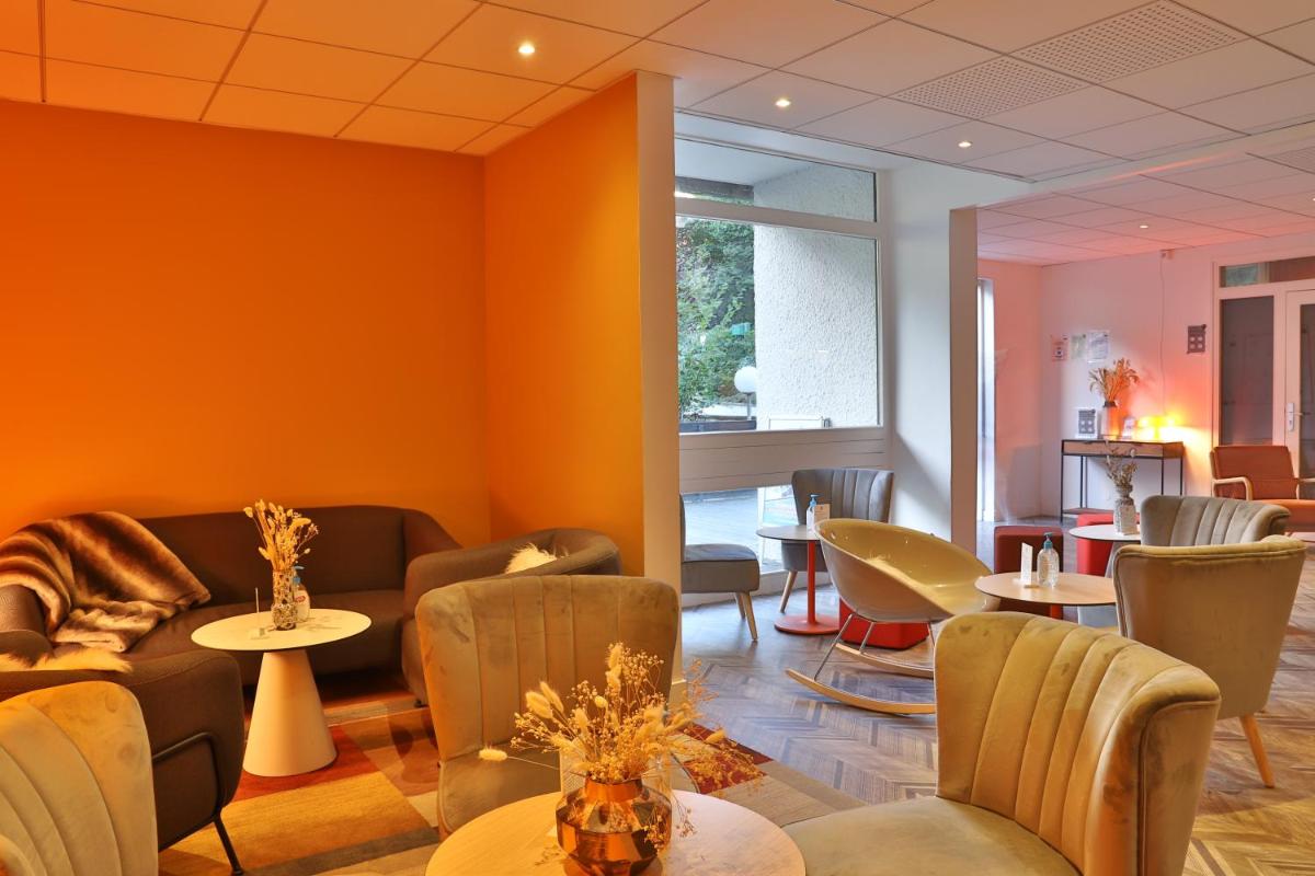 Coin salon dans l'établissement SOWELL HOTELS Mont Blanc et SPA