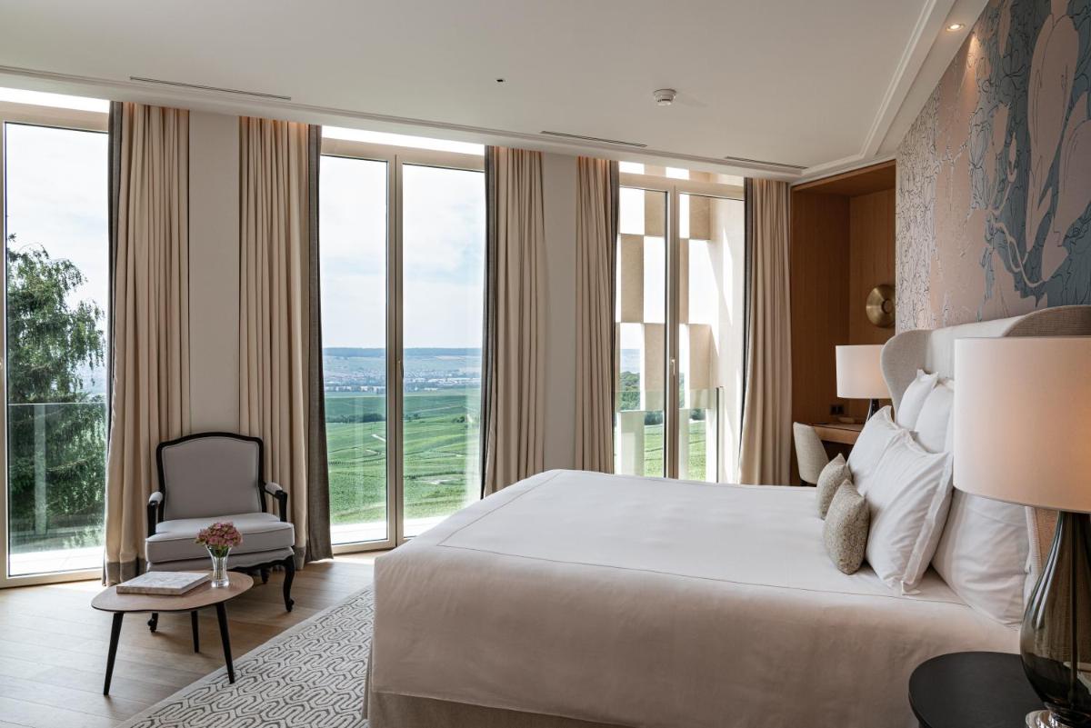 Un ou plusieurs lits dans un hébergement de l'établissement Royal Champagne Hotel & Spa