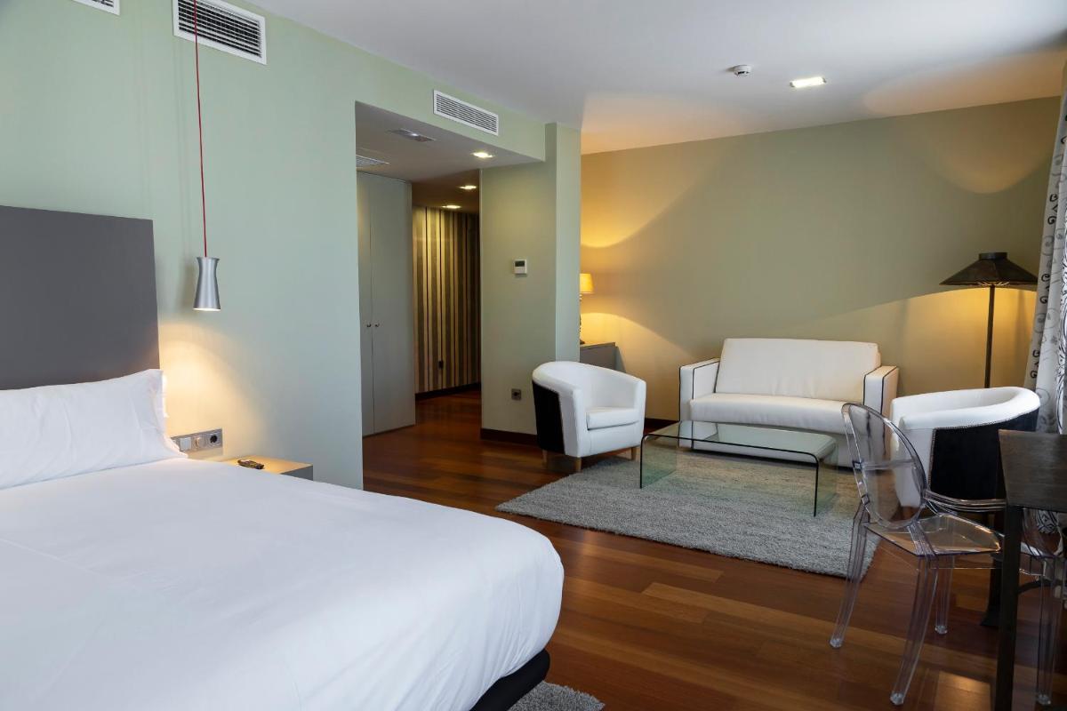 Cama o camas de una habitación en Hotel AR Isabel de Farnesio