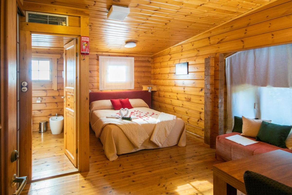 Cama o camas de una habitación en Hotel Somlom - ECO Friendly Montseny