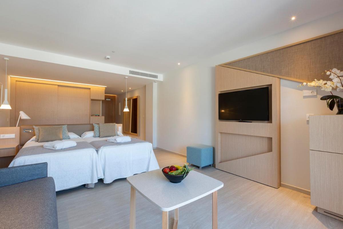 Cama o camas de una habitación en Hipotels Barrosa Park