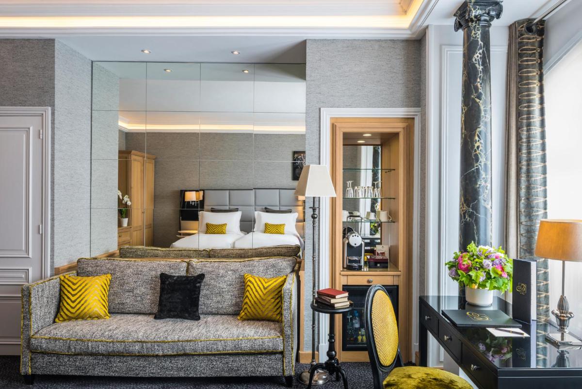 Un ou plusieurs lits dans un hébergement de l'établissement Sofitel Paris Baltimore Tour Eiffel