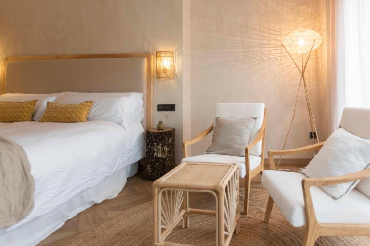 Cama o camas de una habitación en Hábitat Cigüeña Negra