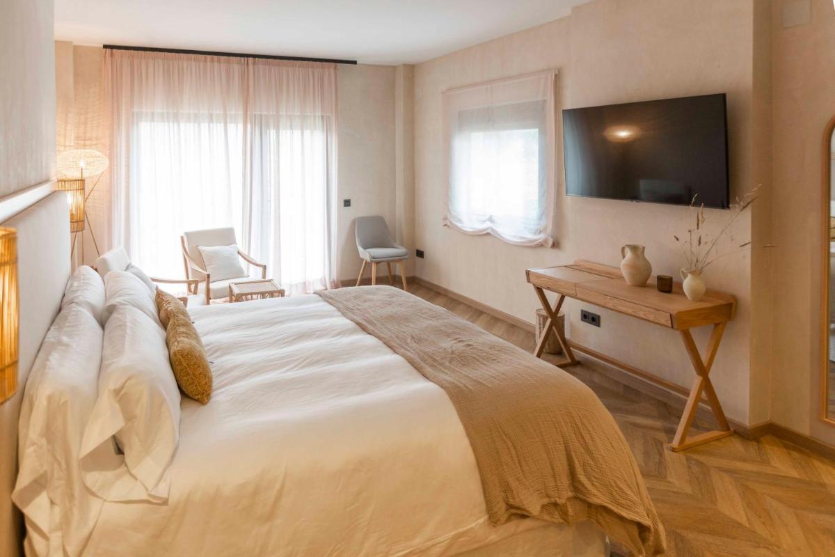 Cama o camas de una habitación en Hábitat Cigüeña Negra