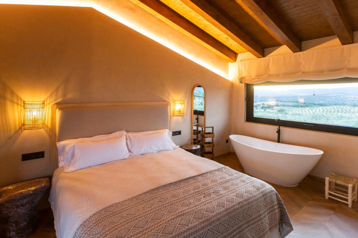 Cama o camas de una habitación en Hábitat Cigüeña Negra