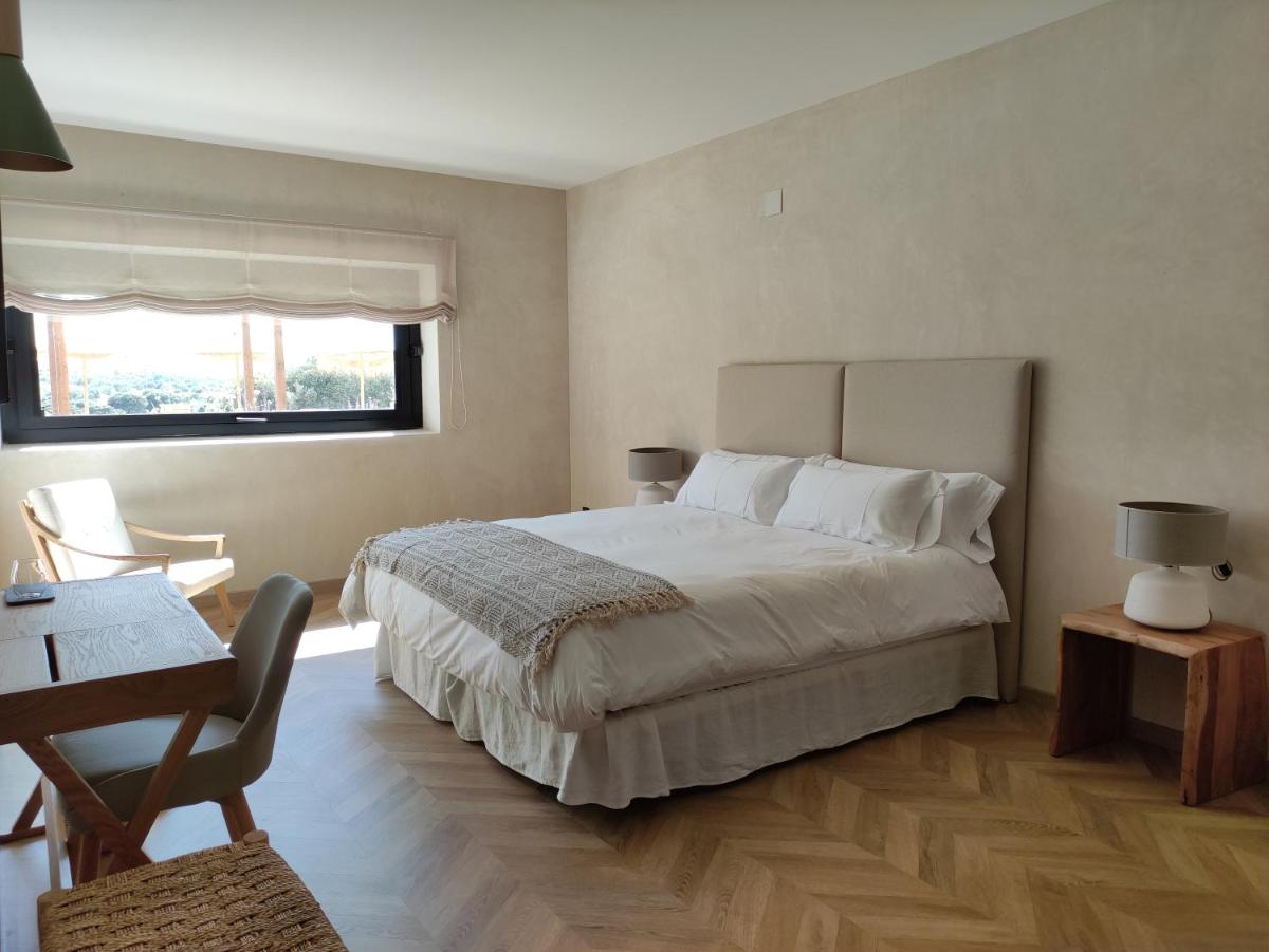 Cama o camas de una habitación en Hábitat Cigüeña Negra