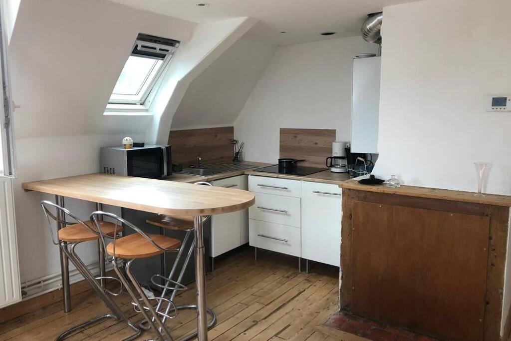 Sous les toits - Housity